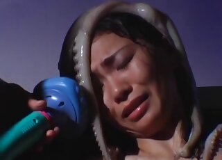 Scary Asian video with a chick that gets horny thanks to octopuses