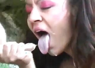 Oversexed Latina teases tits of a cow before milking it properly